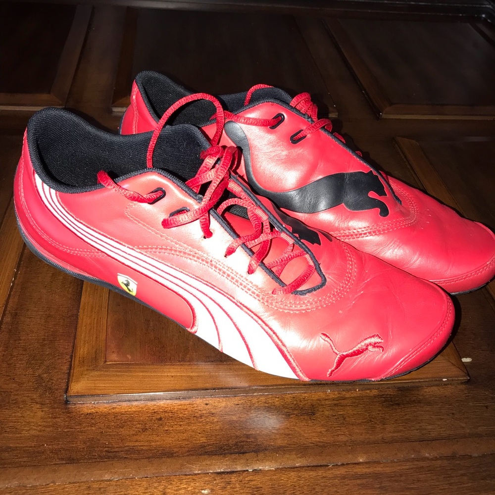 Red, black, and white Ferrari puma sneakers